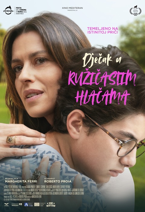 Dječak u ružičastim hlačama